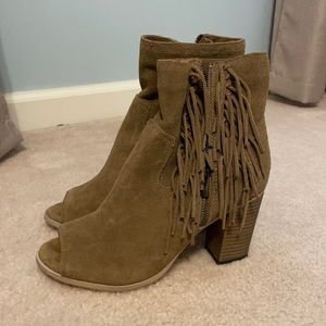 Suede peep toe booties with fringe detail